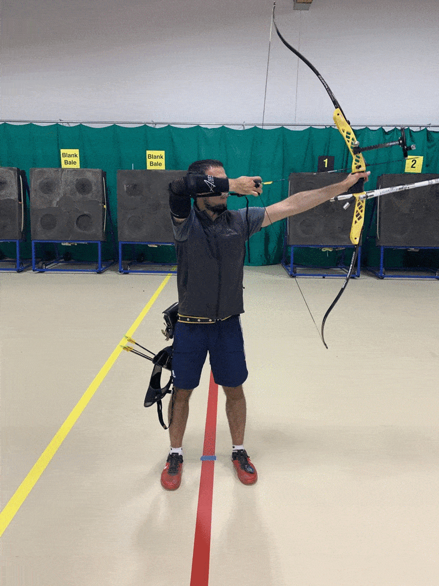 recurve archer showing shot trainer shooting
