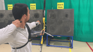 Archer showing how to learn the recurve bow hand follow-through 2