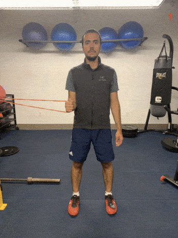 olympic archer showing internal rotations for rehab exercise