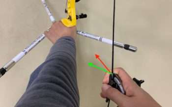 recurve archer showing hooking direction on the string with finger pressure