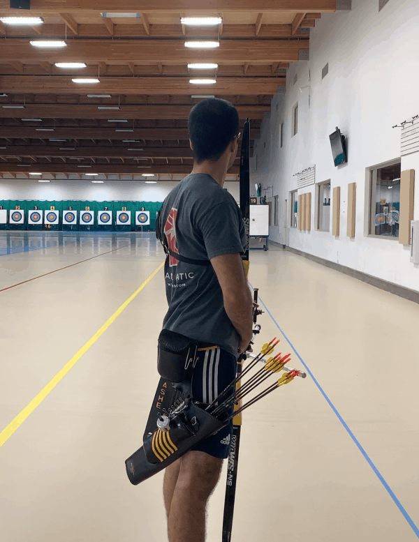 arched back at set position with archery posture